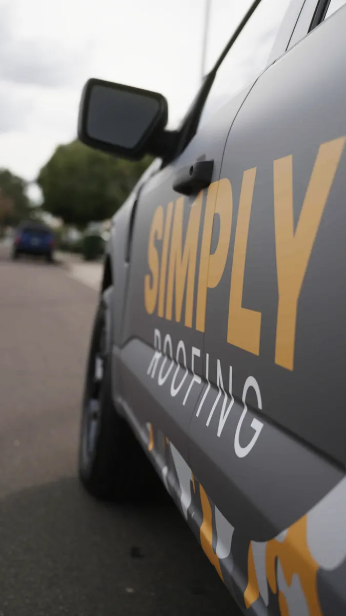 Simply Roofing company truck parked on a residential street